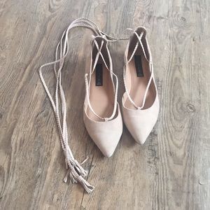 Nude suede lace up flats